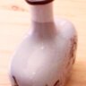 Kerámia likőrös palack.. Áfonyaszüret jelenettel Németországból.